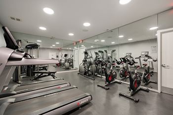 Updated 24-hour fitness center at Franklin River Apartments in Southfield, MI